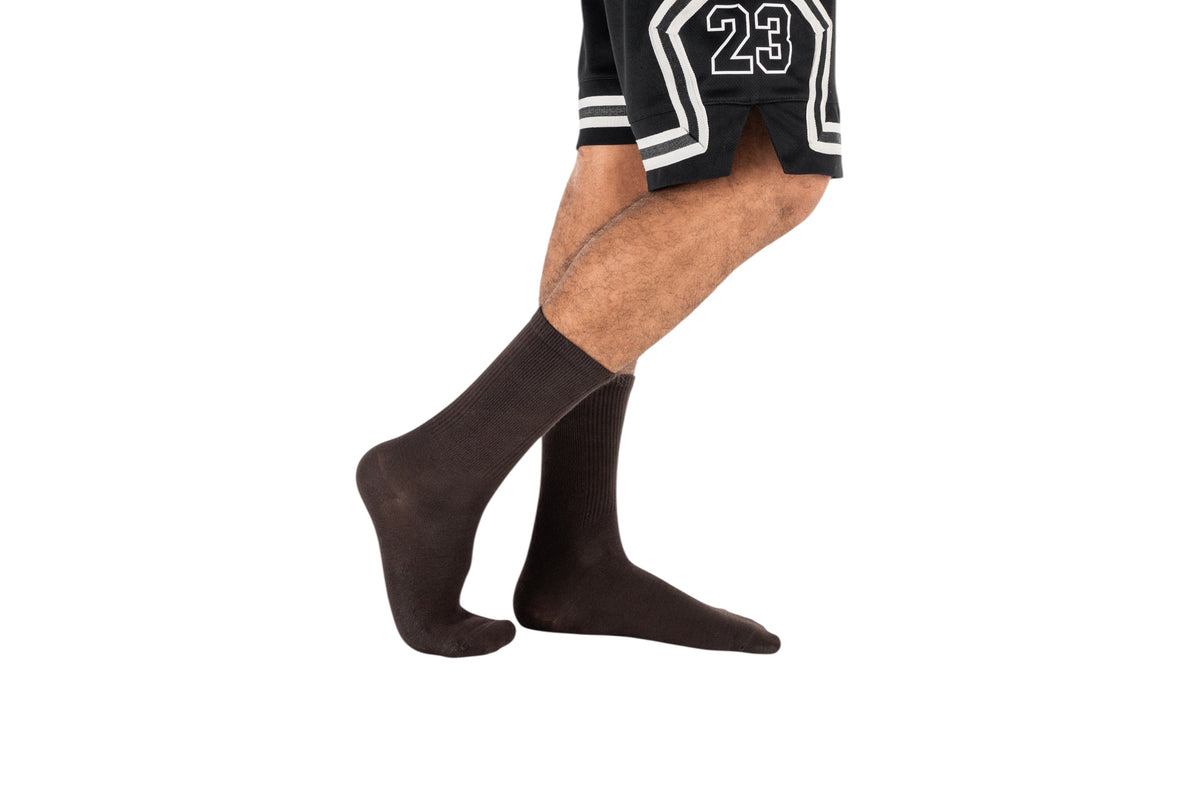 #4d3a34